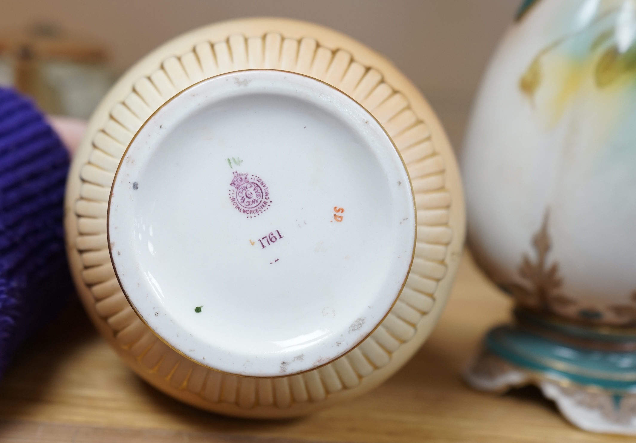 Two Worcester vases comprising blush ivory and one handpainted with roses by A. Watkins, together with a shell dish, largest 25cm high. Condition - largest vase restored